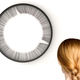 Illustration for article titled Watch the Seconds Blink By on This Freaky Eyelash Clock